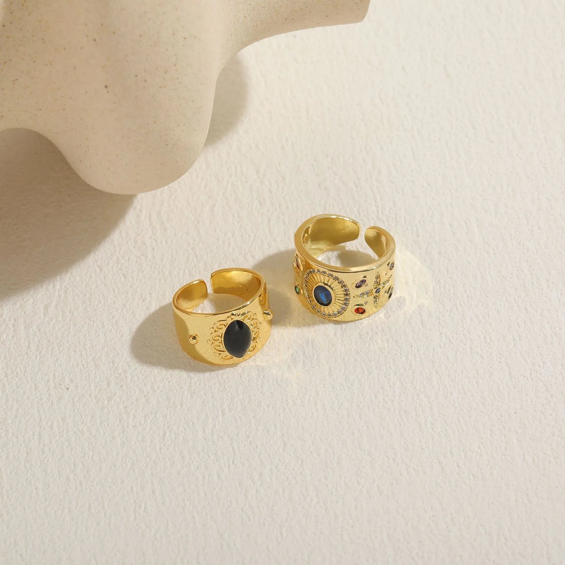 Geometric Chinese style electroplated copper ring in horse eye black colour showing structured design