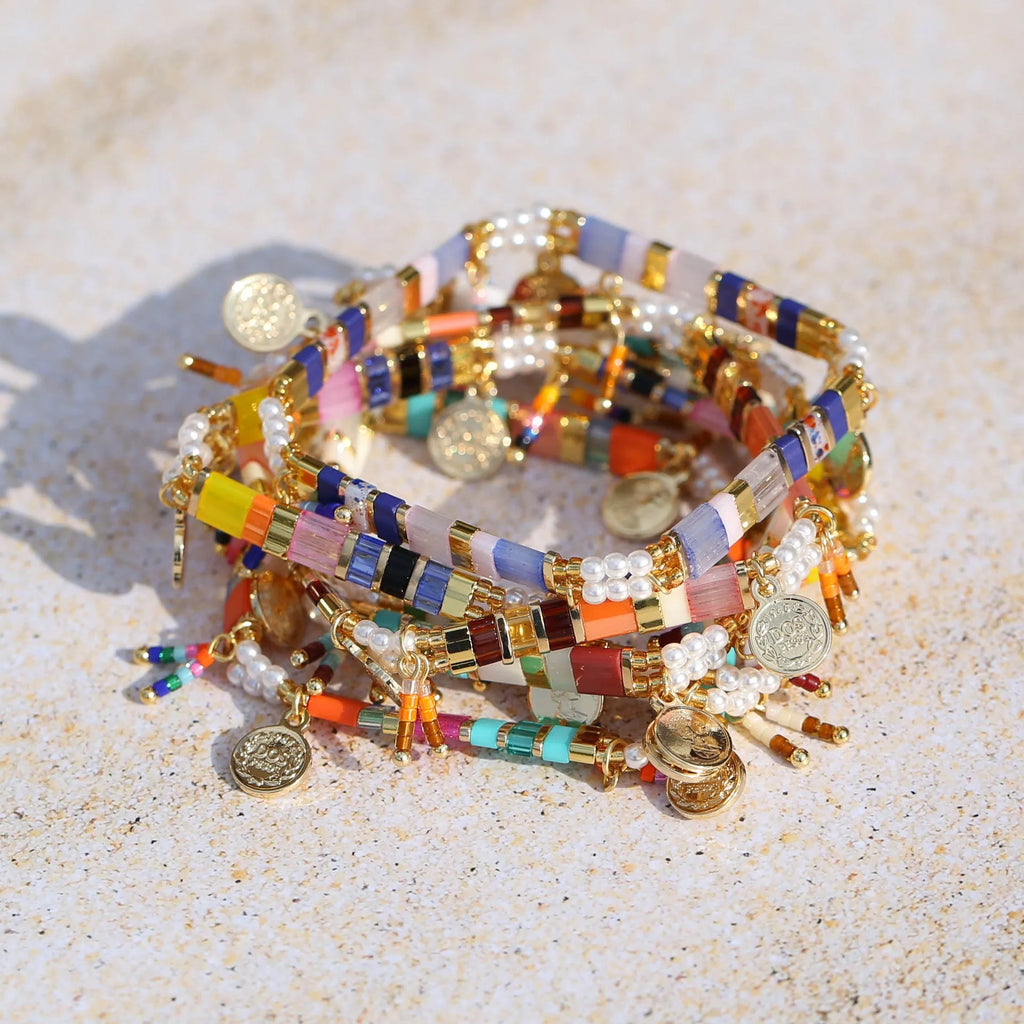 Women's glass coloured beaded bracelet with imitation pearl design showing six colour variations
