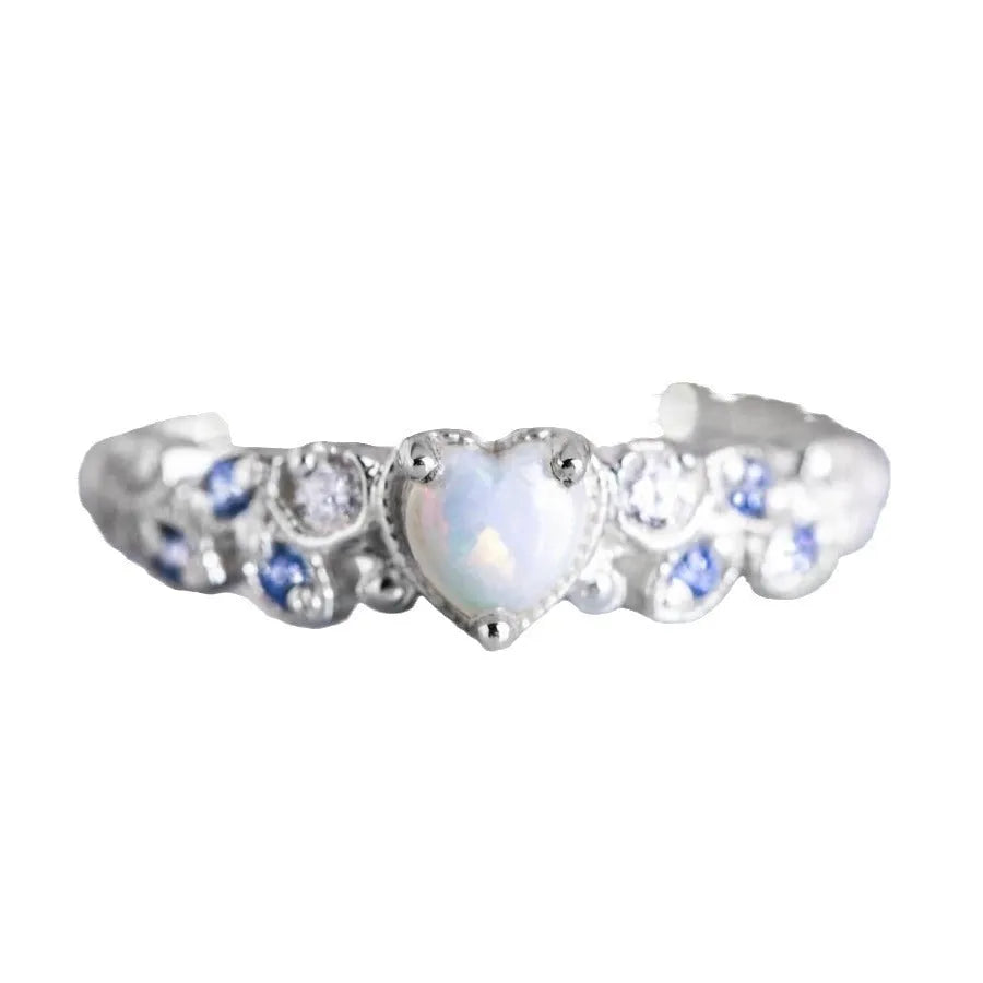 Peach-coloured heart-shaped women's ring with flower and opal ocean design on alloy metal