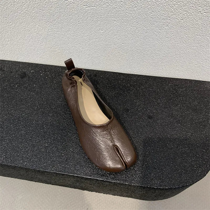 Women's apricot chunky heel pumps with a split toe horseshoe peas design and round toe.