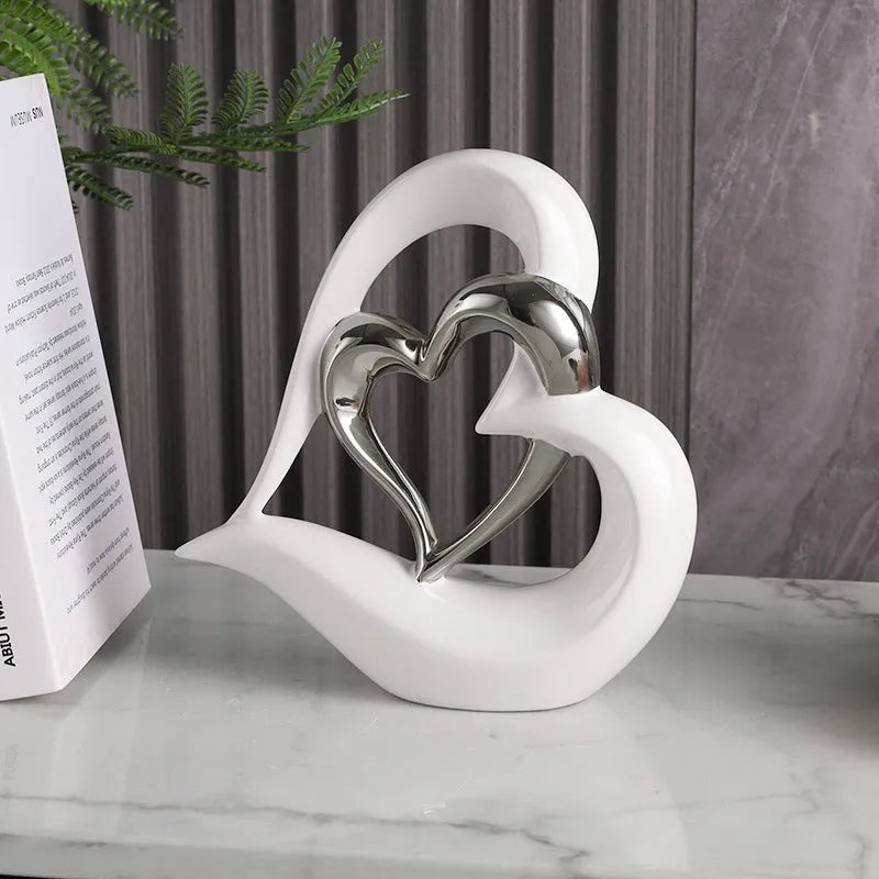 White porcelain heart ornament with geometric design in metallic colour finish