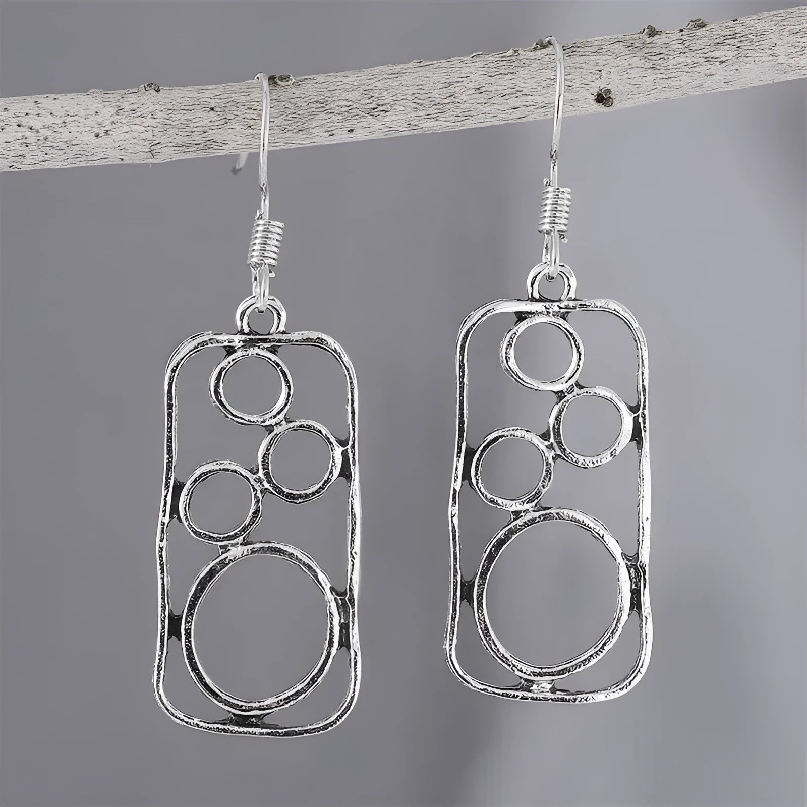 Geometric earrings with round ring and irregular square design in antique silver colour