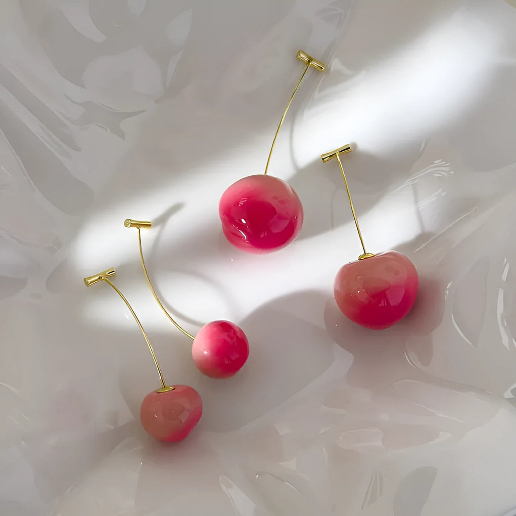 Women's acrylic peach fruit earrings in small and large size options with copper findings