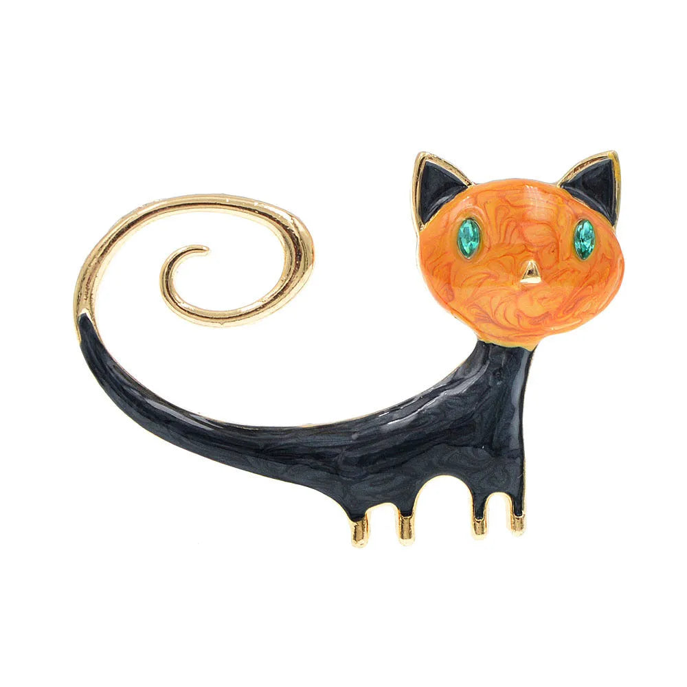 White and orange painted trailing up kitty brooch made from alloy metal