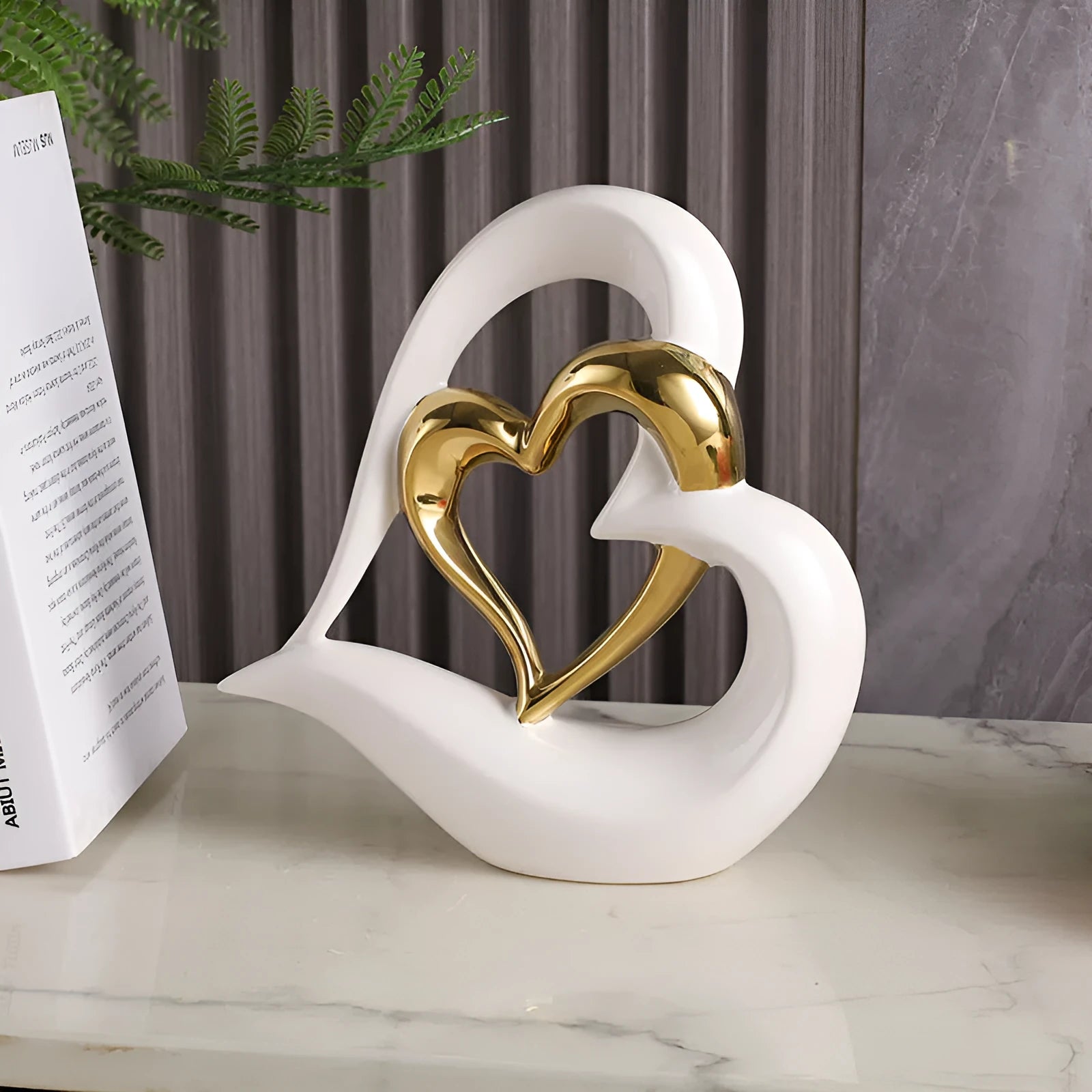 White porcelain heart ornament with geometric design in metallic colour finish