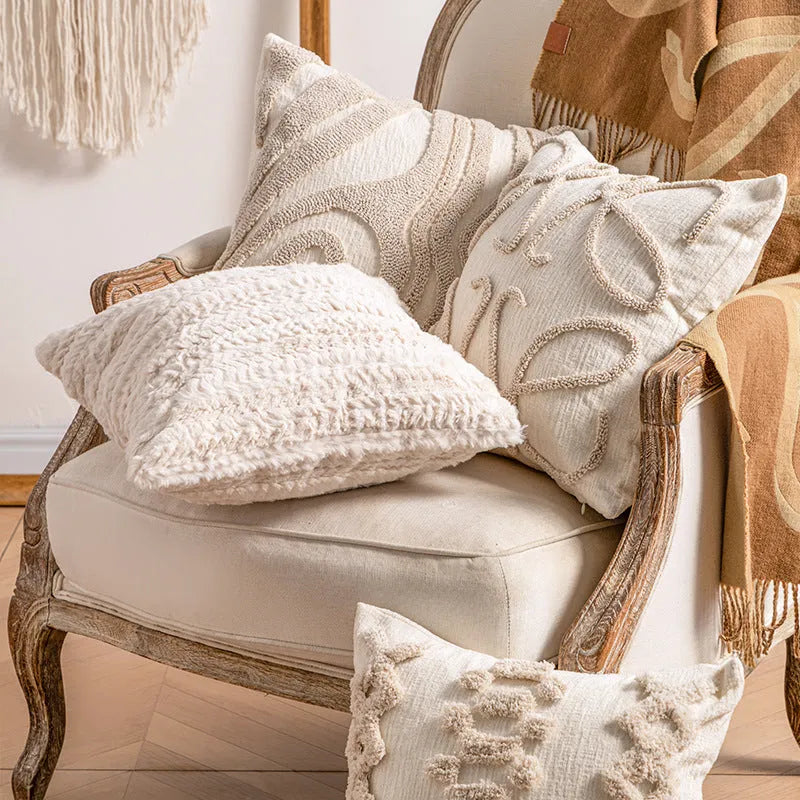 Knitted tassel pillow cover with striped pattern and bow design on home sofa
