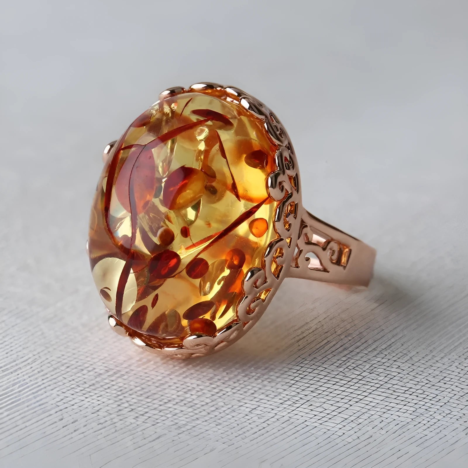 Adjustable alloy beeswax ring with a genuine amber stone in a vintage ethnic style.