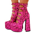 Women's black waterproof platform high heels with a serpentine belt buckle closure and round toe.