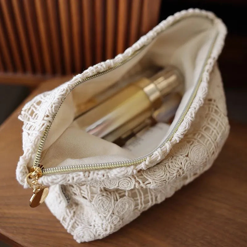 Handmade corduroy cosmetic bag with crocheted hollow flower rope weave and ethnic embroidery in solid color