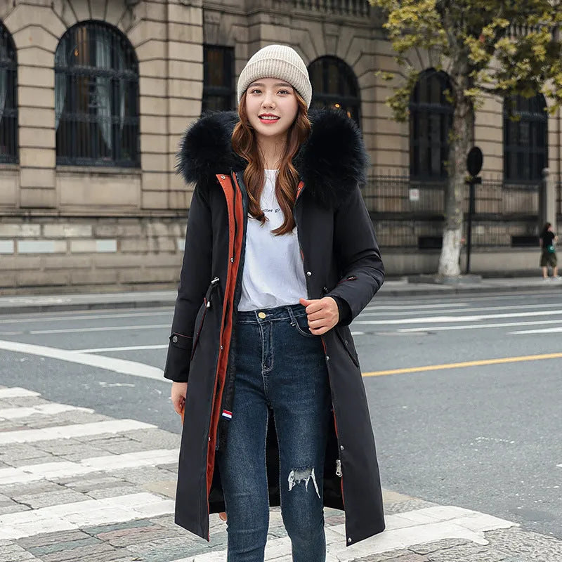 Women's long white trench coat with fleece detailing and a 100cm lengthened fit.