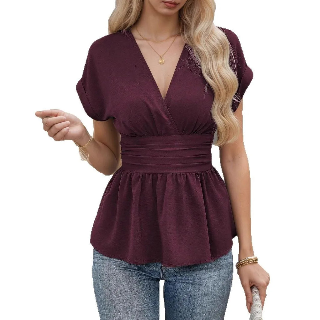 Women's slim fit V-neck short sleeve top with waist pleating in a solid colour.