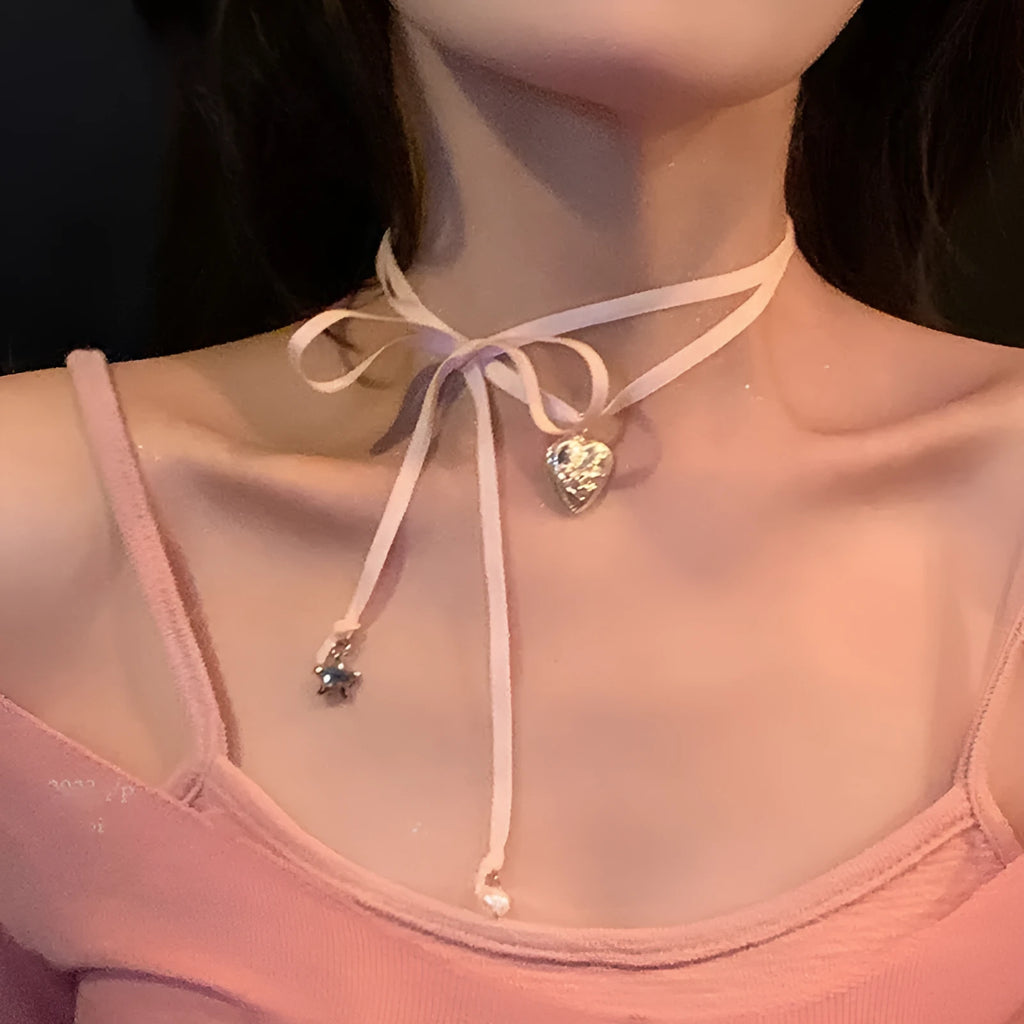 Women's gold-colour ribbon love pendant necklace on slender clavicle chain