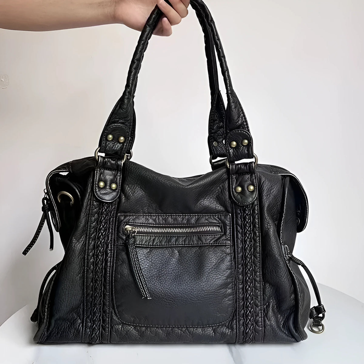 Women's French retro motorcycle messenger shoulder bag in soft PU leather with woven detailing