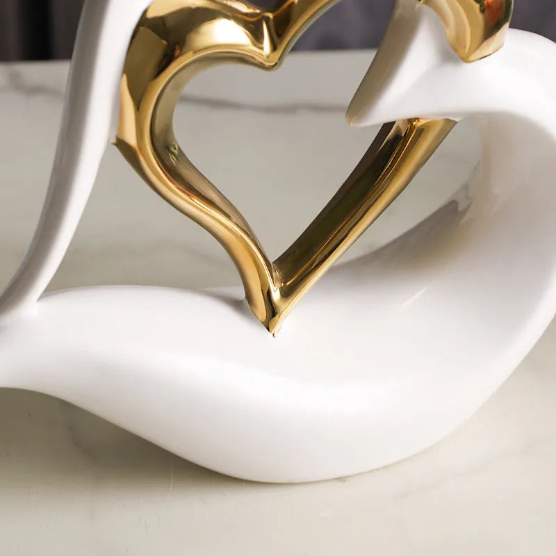 White porcelain heart ornament with geometric design in metallic colour finish