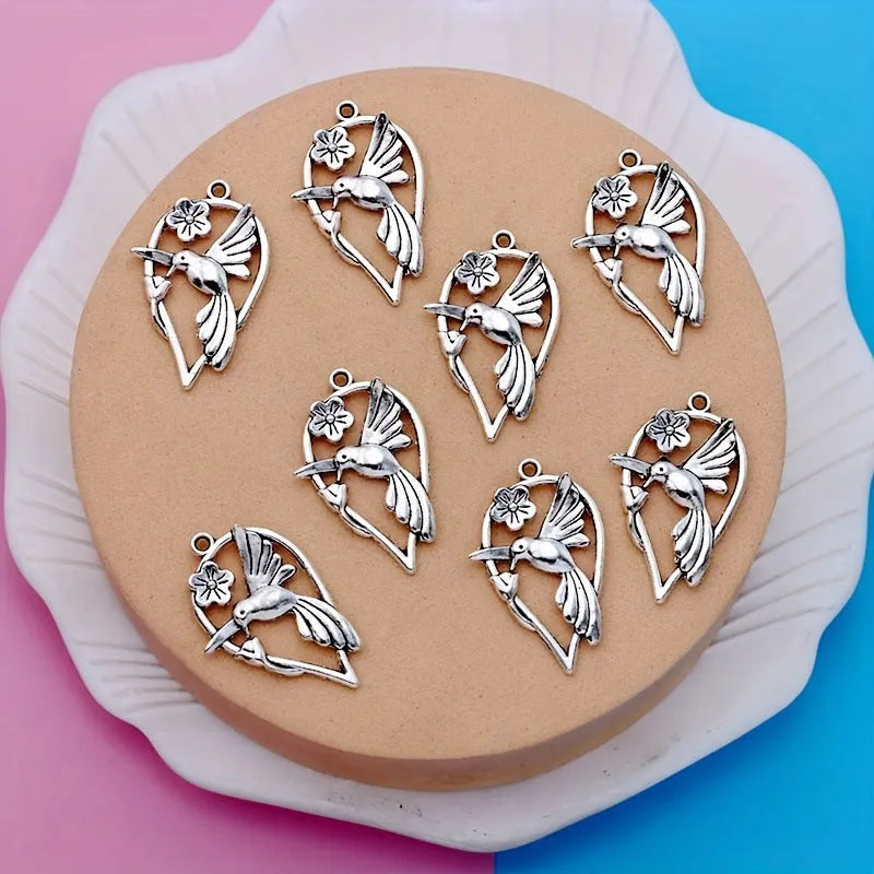 Silver-coloured magpie bird charm pendant for DIY jewellery making