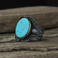 Men's antique silver alloy ring with turquoise centre on round band