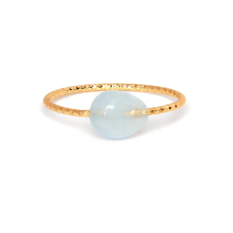 Women's coloured agate ring with geometric design showing natural stone variations