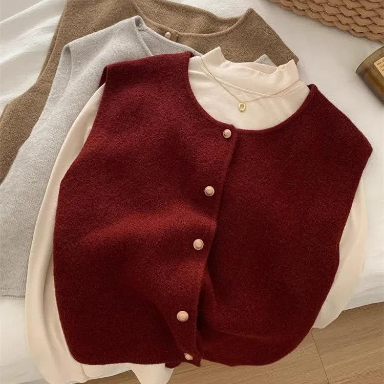 Thin polyester pullover casual top with half sleeves in Angora red, shown on a hanger.