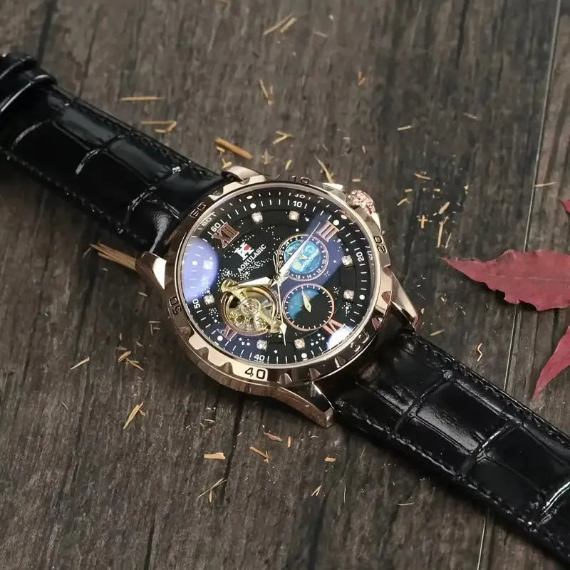 Automatic mechanical watch with hollow dial, black leather strap, and rose gold shell casing