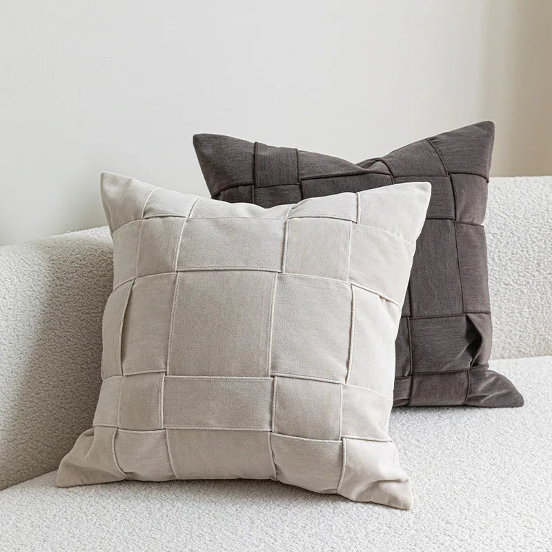 Square 50x50cm chenille woven cushion in a choice of colours like retro green or beige, shown on a sofa.