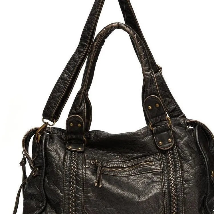 Women's French retro motorcycle messenger shoulder bag in soft PU leather with woven detailing