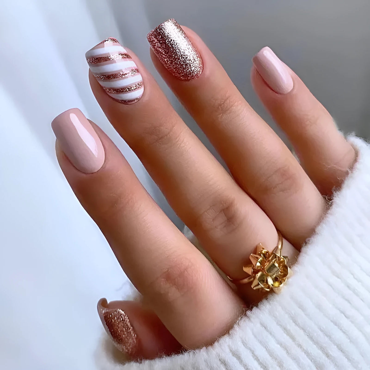 Champagne light white false nails with floral pattern, twill finish, mid-length wearable armour, and glue