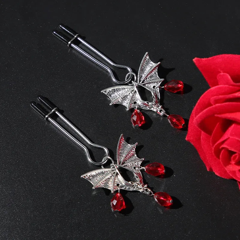 Silver diamond bat nipple clamp with adjustable screw tension mechanism