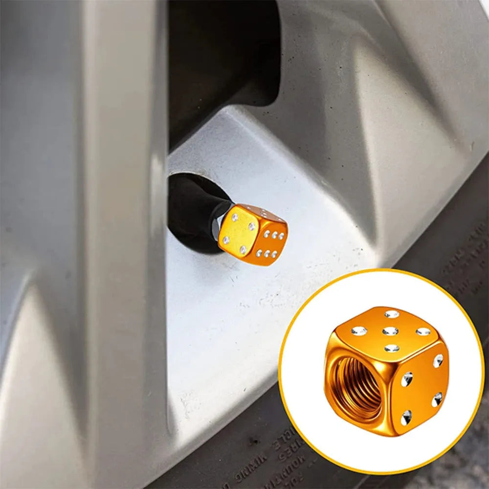 Aluminium alloy dice valve cap in assorted colours for American valve stems on car and motorcycle wheels.