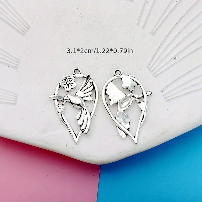 Silver-coloured magpie bird charm pendant for DIY jewellery making