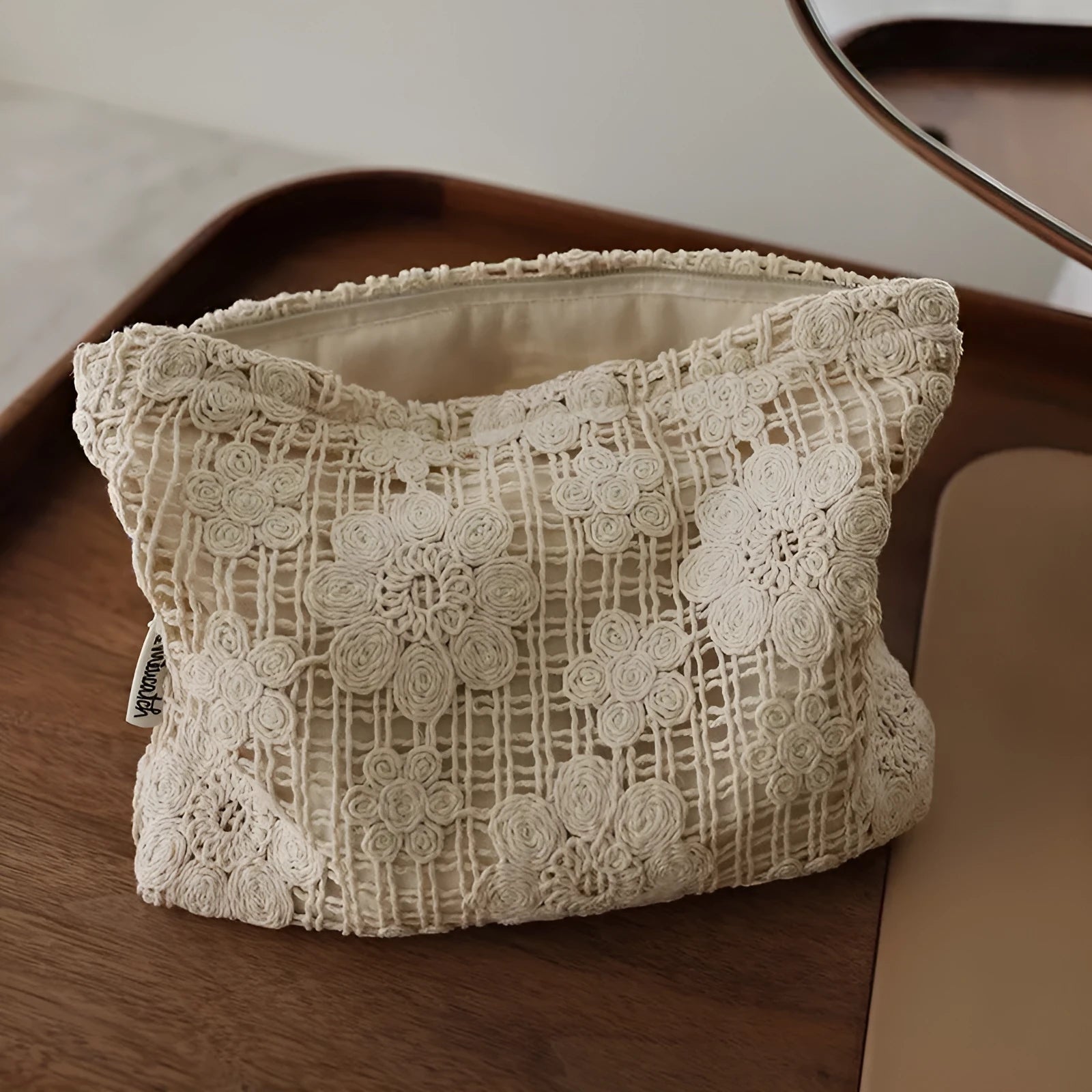 Handmade corduroy cosmetic bag with crocheted hollow flower rope weave and ethnic embroidery in solid color
