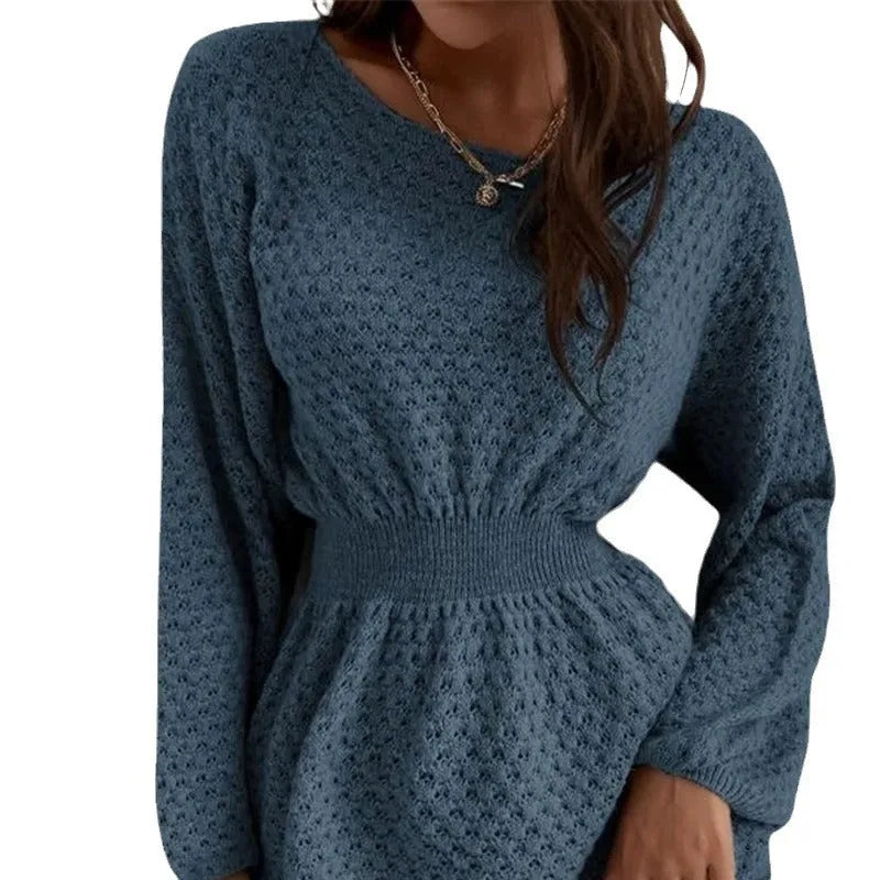 Blue women's knitted dress with crocheted flower details and fitted waist design