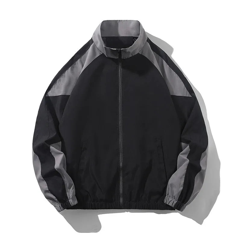Men's black and dark blue colour block casual jacket with contrast stitching and side pockets.
