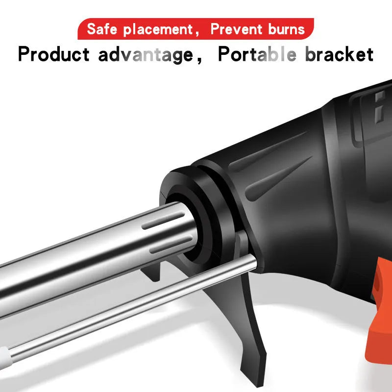 Black G102 soldering gun with LED light, part of a five-piece tool kit on a workbench