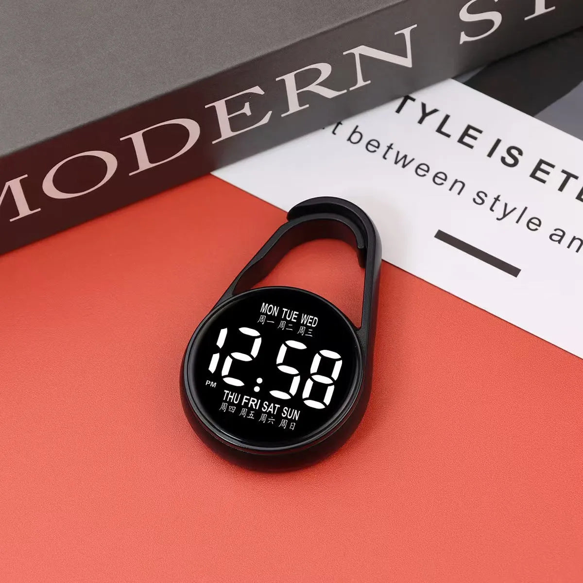 LED luminous electronic digital watch with plastic strap, shown in one of ten available colours on a wrist.