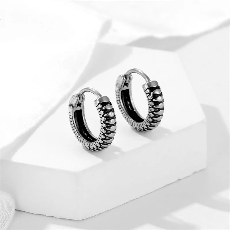 Silver geometric earrings with striped retro design made from stainless steel.
