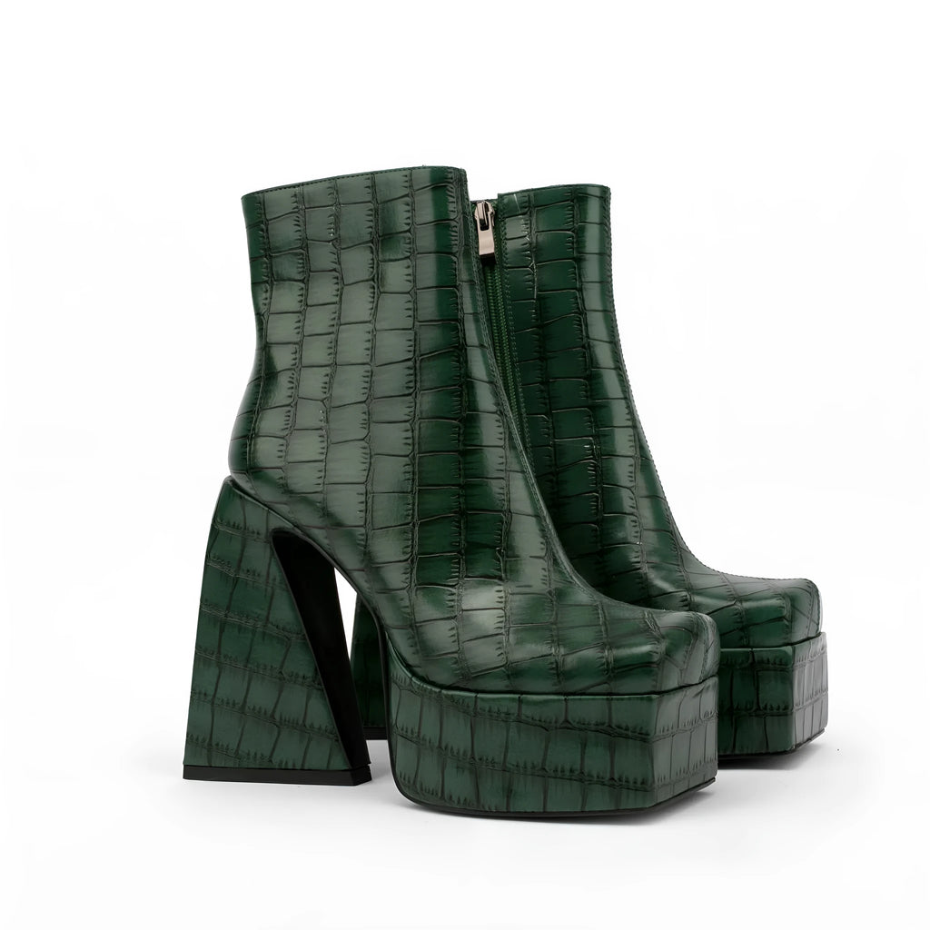 Women's ankle boot in artificial PU leather with a high heel, shown in a solid colour.
