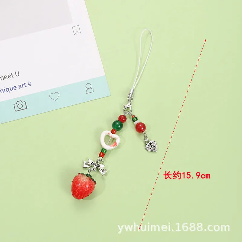 Plastic resin iPhone charm bag pendant keychain with fruit patterns including apple core and strawberry designs