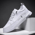 Men's black and white microfiber skateboard shoes with elastic band fastening and rubber soles