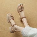 Women's beige chunky heel platform sandals with open toe and adjustable ankle strap.