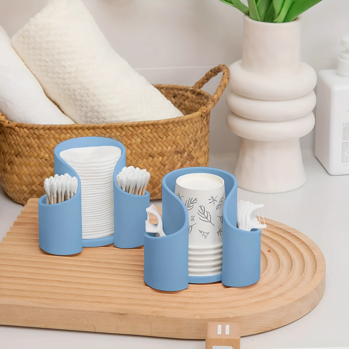 A simple plastic cotton box for storage in a choice of pink, white, blue, or black.