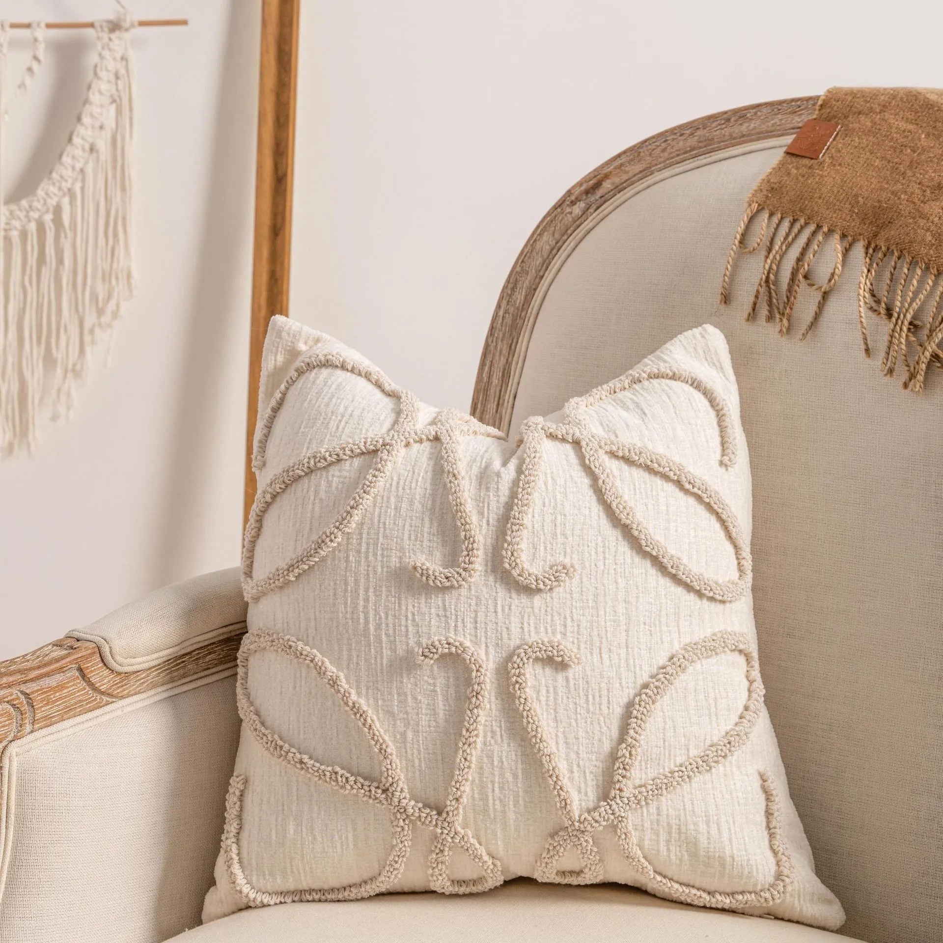 Knitted tassel pillow cover with striped pattern and bow design on home sofa