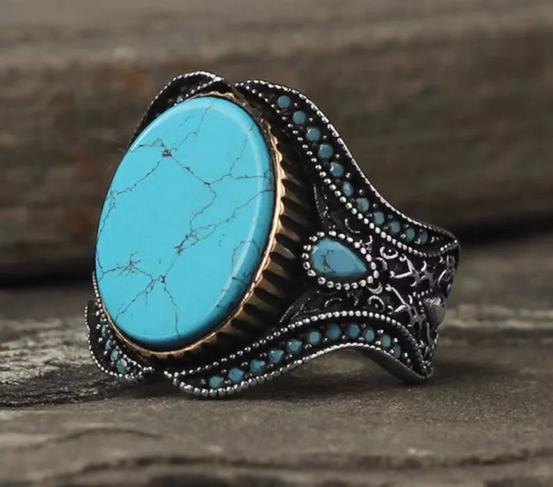 Men's antique silver alloy ring with turquoise centre on round band