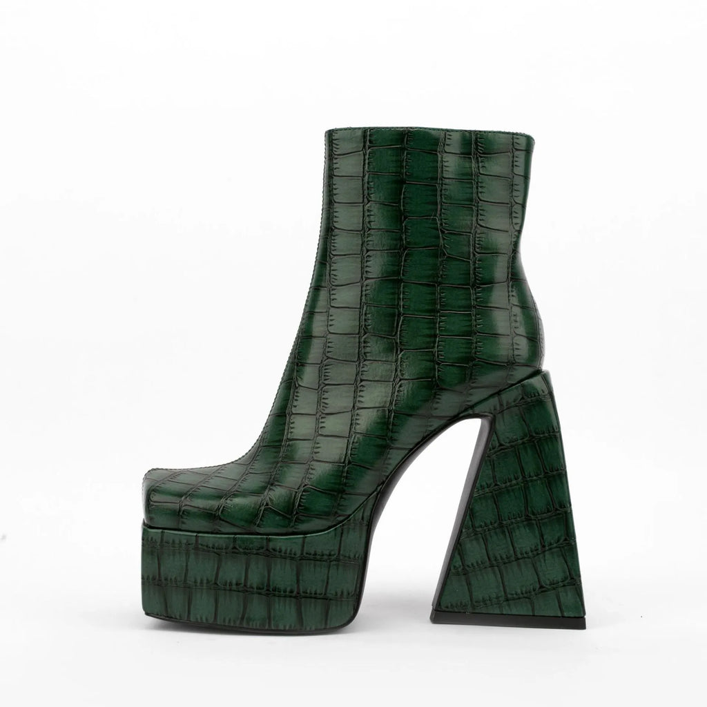 Women's ankle boot in artificial PU leather with a high heel, shown in a solid colour.