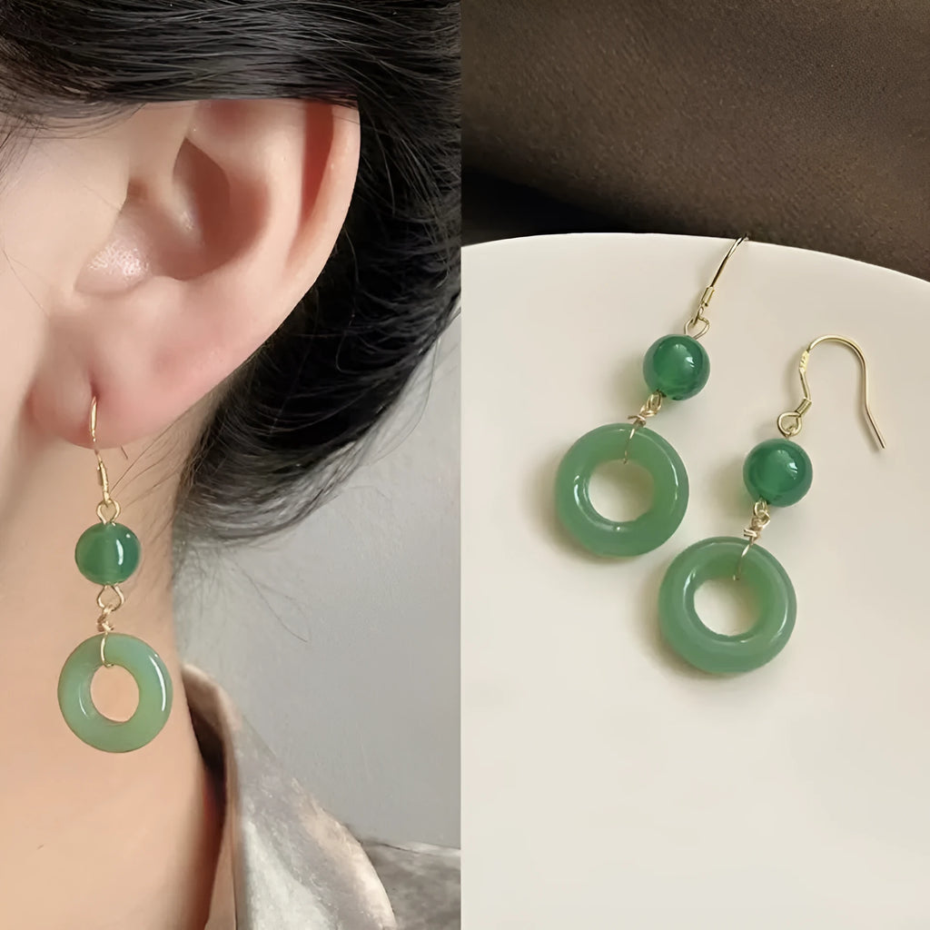 Green Chinese style peace buckle shaped earrings with geometric design and gold plating