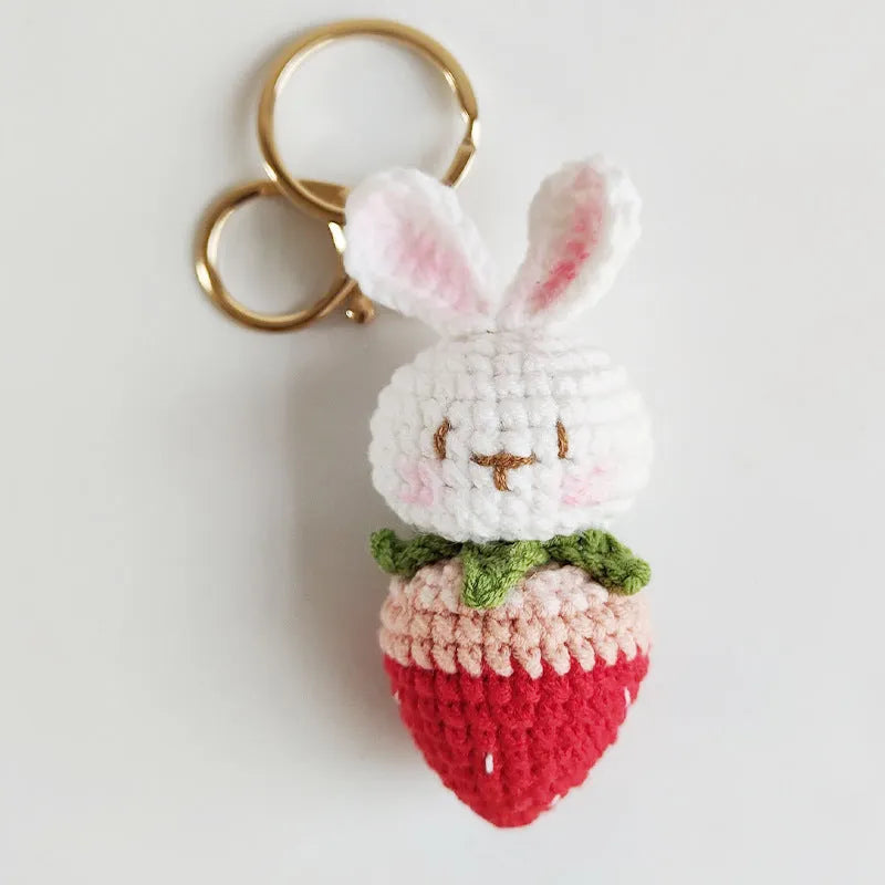 White hand-woven rabbit strawberry pendant on keychain made from doll wire