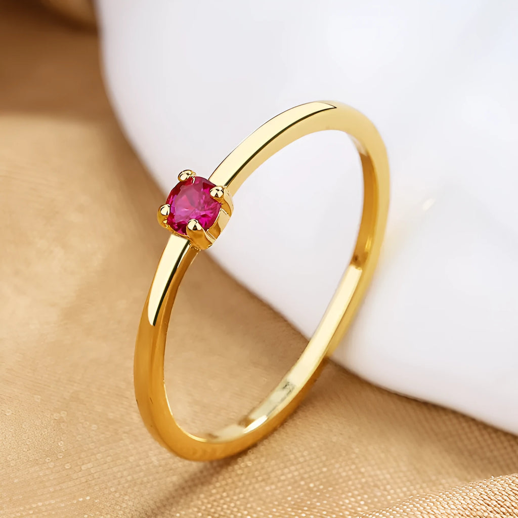 Copper geometric circle ring for women with a single diamond style in blue, green, red, or white on a size guide.