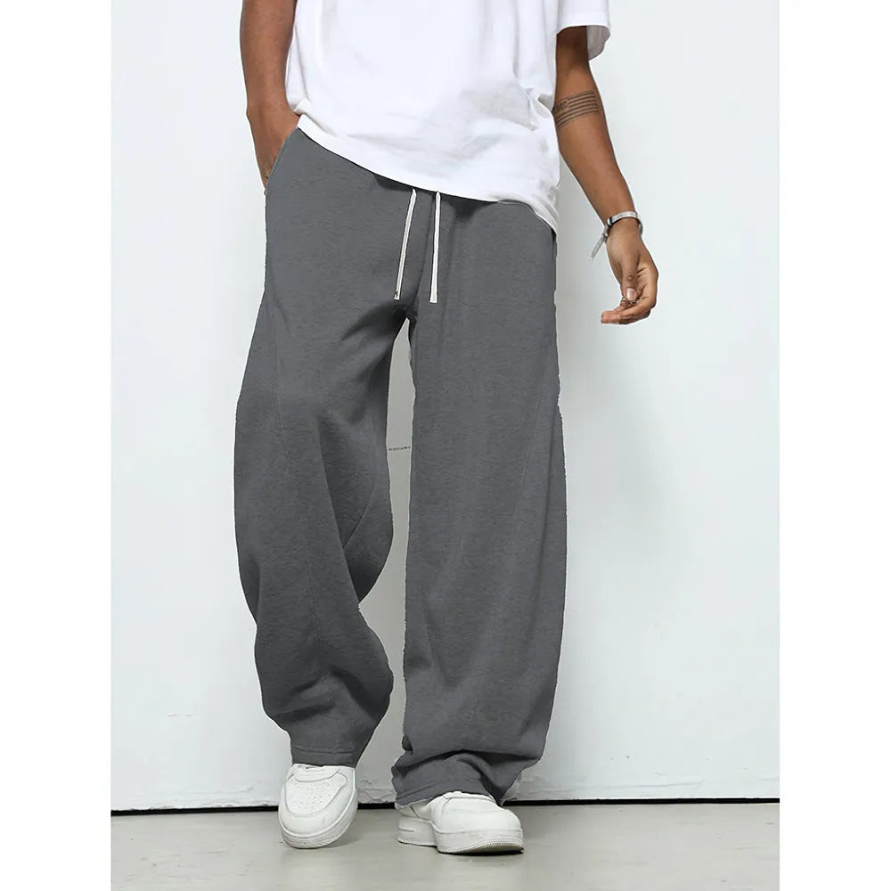Men's straight-leg casual trousers in black polyester with a drawstring waistband.
