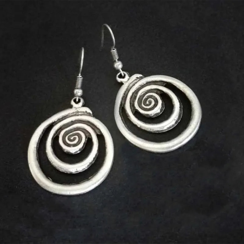 Geometric spiral distressed silver alloy earrings measuring 2.6 by 5 centimetres