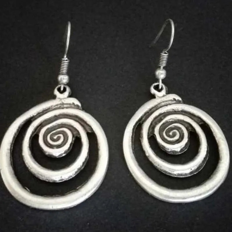 Geometric spiral distressed silver alloy earrings measuring 2.6 by 5 centimetres