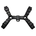 Black leather chest strap with metal buckle and rivet detailing for adult male costume wear